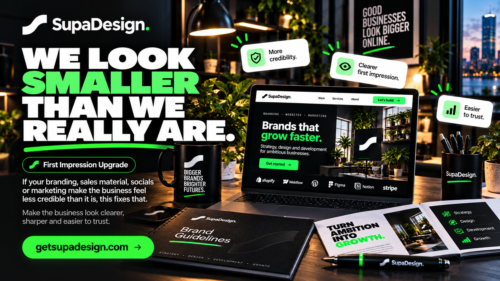 We look smaller than we really are — the SupaDesign site on a laptop with printed brand guidelines and brochure on the desk